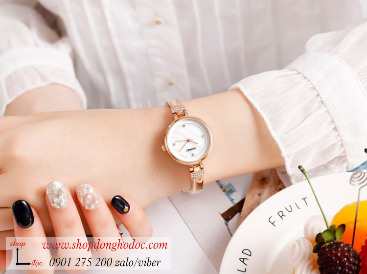 Đồng hồ nữ dạng lắc tay mặt nhỏ Skmei dây kim loại mặt tròn vàng sang chảnh ĐHĐ26002 Đồng hồ nữ dạng lắc tay mặt nhỏ Skmei dây kim loại mặt tròn vàng sang chảnh ĐHĐ26002